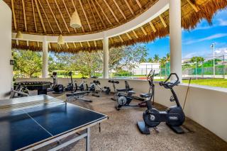 Ocean-view getaway with patio, grill, roof deck, & on-site pools - 3