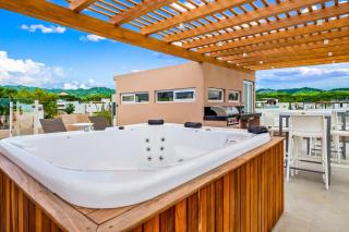 Ocean-view getaway with patio, grill, roof deck, & on-site pools - 2