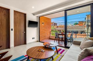 2nd-floor condo with heated outdoor pool, grills, balcony, W/D, AC - 2