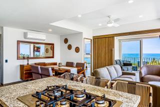 Ocean-view condo in Puerto Vallarta with rooftop pool, fitness room, and balcony - 1