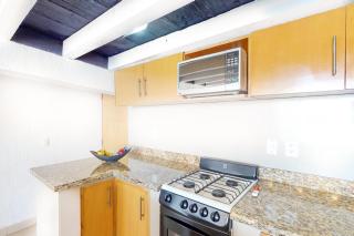 Modern & bright condo with ocean views & pool - walk to the beach - 4