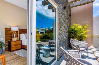 Ocean-view getaway with patio, grill, roof deck, & on-site pools - 7