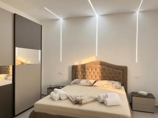 -Garden Suite-5 min dal mare Wifi AC 4 posti letto - 2
