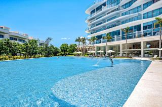 Updated condo with sweeping views, pools, fitness room, balcony, W/D, and AC - 8