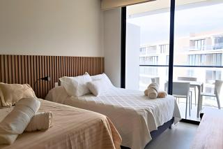 Vista al Mar + Salida Directa a Playa | 2 Suites - 6