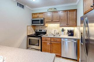 Fourth Floor Oceanfront Condo with Shared Pool Ocean View Laundry and AC - 2