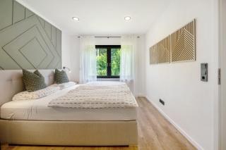 Design-Apartment mit Garten - 1