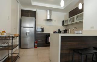 Stylish Condo with Rooftop Pool and Gym - 8