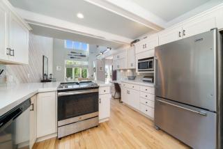 Enjoy North Beach Living - Multiple Patios with Partial Lake Views - 2