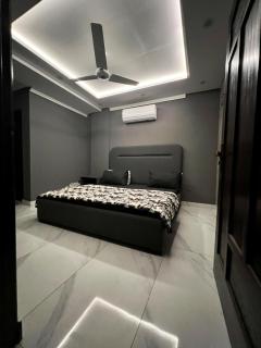 2BR Chic Charcoal & Chocolate Designer Apartment - 1