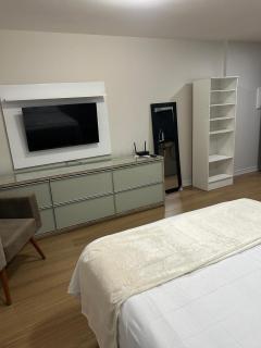 Flat Exclusivo com Rooftop e Piscina - 1