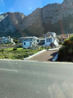 Clifftop Bliss Where Ocean Meets Mountain - 4