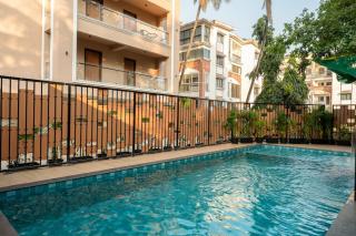 Modern 1BHK in Candolim with Pool & Gym near the Beach by HIREAVILLA - 7