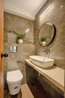 Modern 1BHK in Candolim with Pool & Gym near the Beach by HIREAVILLA - 1