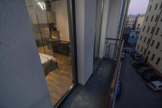 Modern Studio & Balcony on a Quiet Riga Street - 9