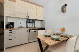 2-Bedroom Family Apartment with Parking and Balcony by Noclegi Renters - 1