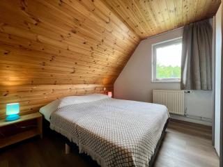 OV790 - Comfortabel 10-persoons vakantiehuis aan het water met eigen aanlegsteiger nabij Giethoorn - 1