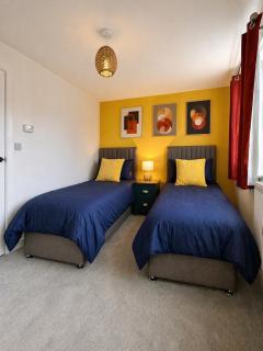 CHARMING VILLAGE HOME, stylish interior, FREE PARKING for 2 cars, private rear garden, 2 DOUBLE BEDROOMS and easy access to M1 - 4
