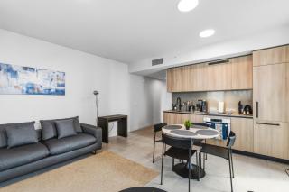 Prime Downtown Stay with Sweeping City Views - 1