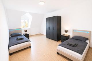 LETA Homes - Komfortable FeWo mit Traumbalkon mit flexiblem, Self-Check-In & eigenen Parkplätzen - 8