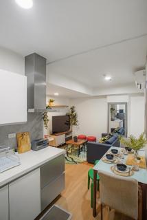 Bright & Cozy 2BR Azure Beach Pool Sleeps 7 - 0