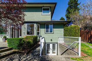 Cozy 2BR Retreat Near Lonsdale with Private Yard - 4