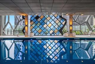 High-End Luxury CBD Suite Heated Pool Gym Sauna - 2
