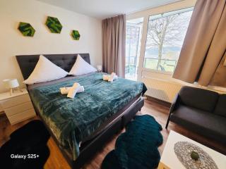 Ferienwohnung Harmonia inklusive Hallenbad, Außenpool, Sauna & Fitnessstudio, familienfreundlich ausgestattet, großes 2-Zimmer-Apartment - 0