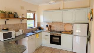Peaceful 2-Bedroom Tramore Home with Wood Burning Stove and Sunny Balcony, Short Walk to Beach, Pet Friendly - 1