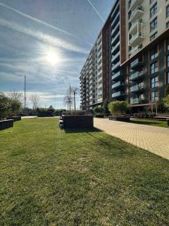 Modern 1BR Apartment with Private Parking and Terrace near Romexpo - 3