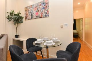 Stylish 2BR Retreat North of Central Park - 6