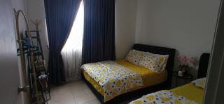 Dee's Cozy Homestay at SouthVille Apartment - 7