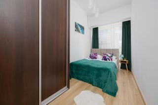 City Apartment with Two Bedrooms Near the Metro in Warsaw by Noclegi Renters - 5