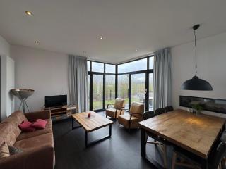EuroParcs Bad Meersee Chalet Küstenzeit mit Zaun Haus Nr 97 - 3