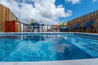 Casa Luz da Lua - Barra Grande - Maraú - Piscina privativa com deck de madeira à beira do lago - 0