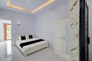 Hotel O near Mangusada Hospital formerly Rare Home Cozy Stay Premier 2 - 0
