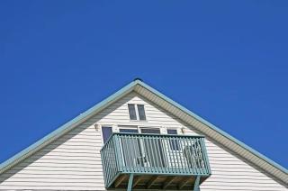 1BR beachfront condo kitchen & sea-view balcony - Unit E - 2