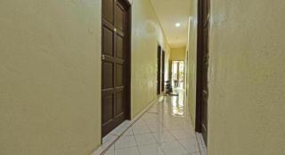 OYO 90596 Casaria Inn - 8