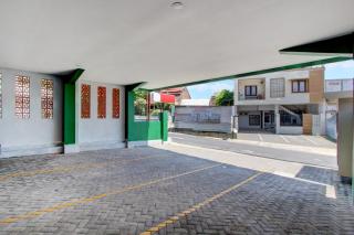 OYO 95180 Enshe Guest House Syariah - 6
