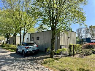 EuroParcs Bad Hoophuizen Chalet Glücksort mit Zaun Haus Nr Water03 - 6