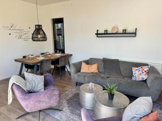 EuroParcs Bad Hoophuizen Chalet Glücksort mit Zaun Haus Nr Water03 - 5