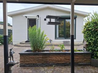 Happy Place is een modern en comfortabel chalet met een grote afgesloten tuin op de Veluwe, Recreatiepark De oude Driest - 9
