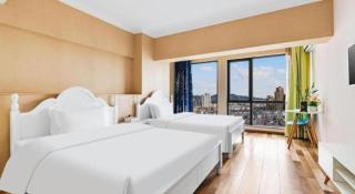 Kunming Tong Yi Business Hotel - 9