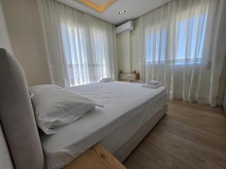 Sunny Waves Seafront Apartment - 1