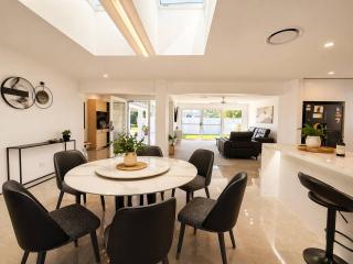Azure Waters - 4BR Stylish Waterfront Stay in GC with pool - 2
