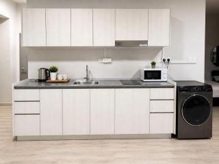 Quayhaus KK Jesselton Quay wash and dry washing machine water dispenser provided - 2