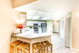 Beachfront condo with shared outdoor pool heated indoor pool sauna & grill area - 3