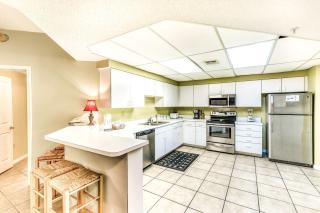 Beachfront condo with shared outdoor pool heated indoor pool sauna & grill area - 2