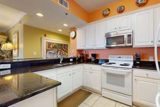 Waterfront condo with expansive corner balcony grill area & multiple shared pools - 2