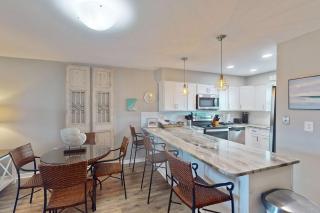 Updated condo with Gulf & river views & pool - across from beach & near dining - 2